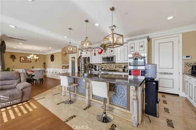 a living room with lots of furniture and appliances