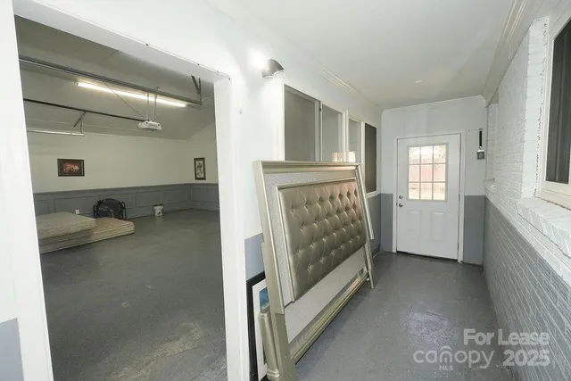 a view of livingroom with furniture and window