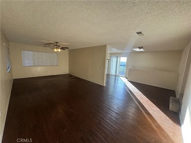 a kitchen with a stove a refrigerator and a sink