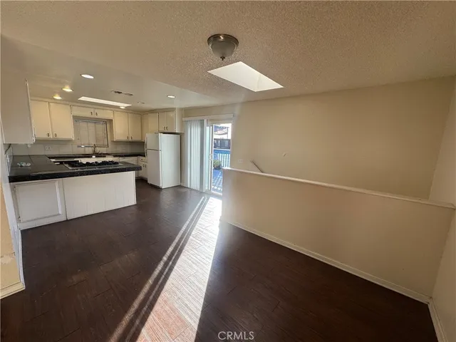 a view of a hallway and closet