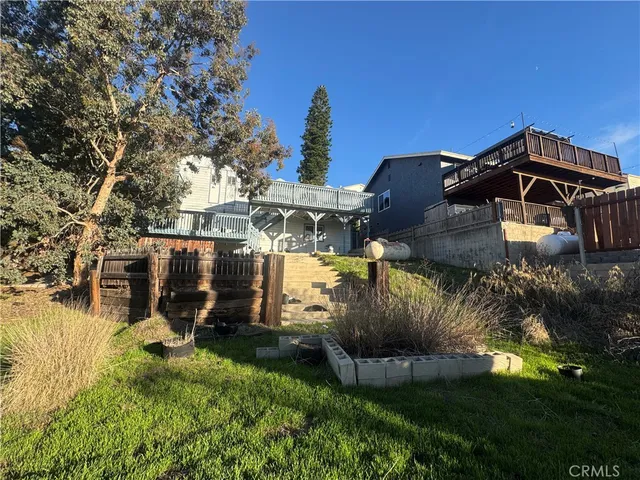 a backyard of a house with lots of green space