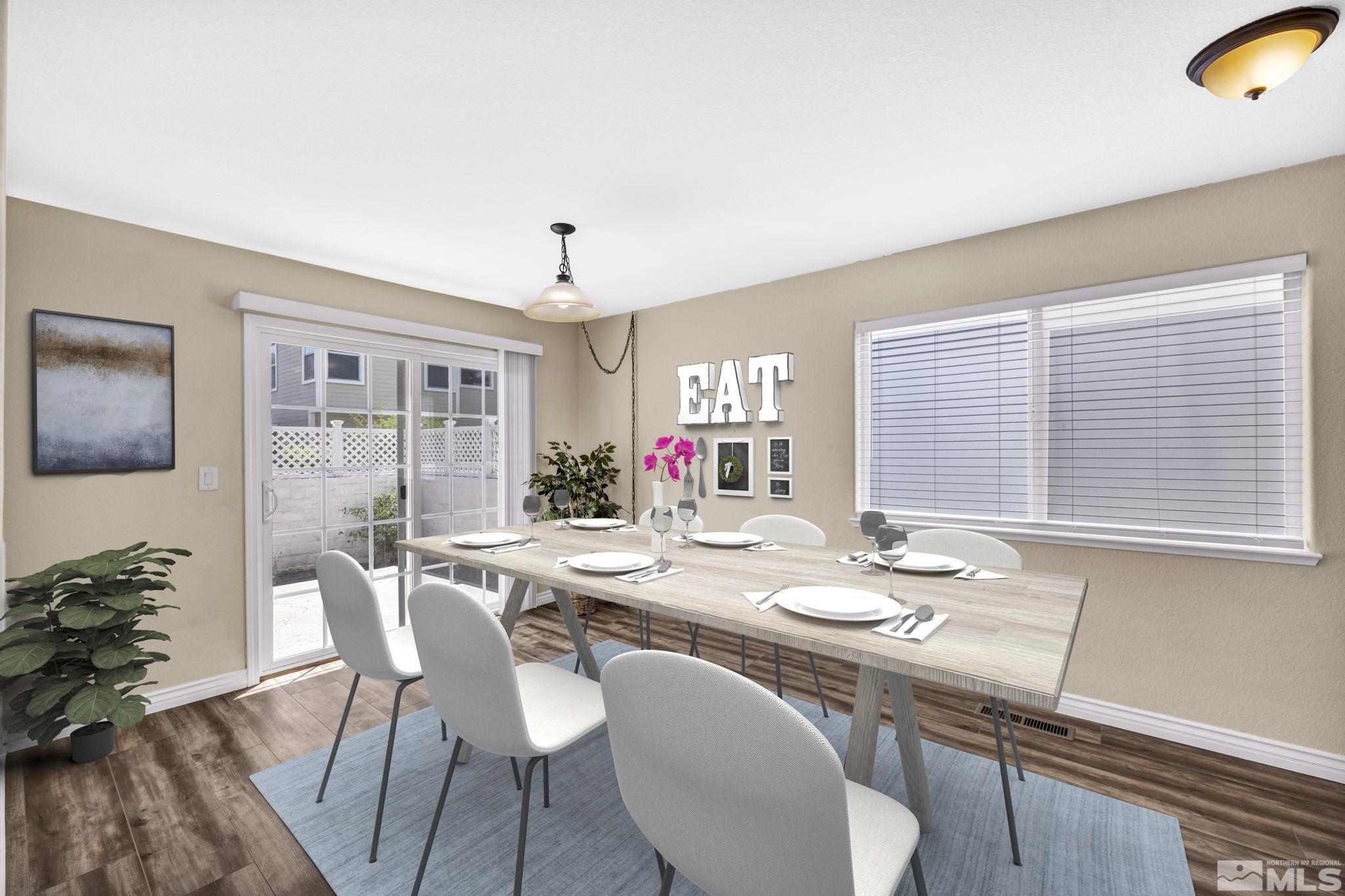 7491 Wheeldale Circle Reno, NV 89511 - Photo 12 of 33 a dining room with furniture and wooden floor