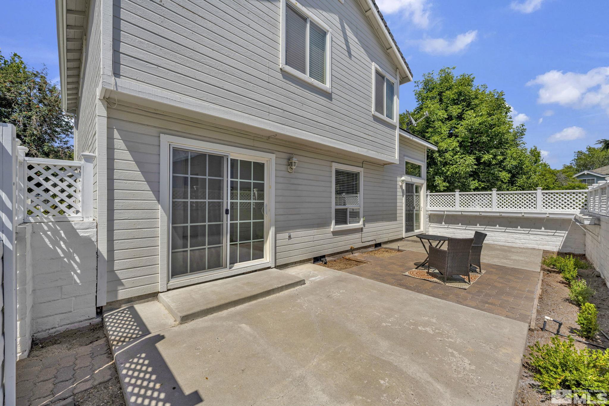 7491 Wheeldale Circle Reno, NV 89511 - Photo 13 of 33 a backyard of a house with outdoor seating