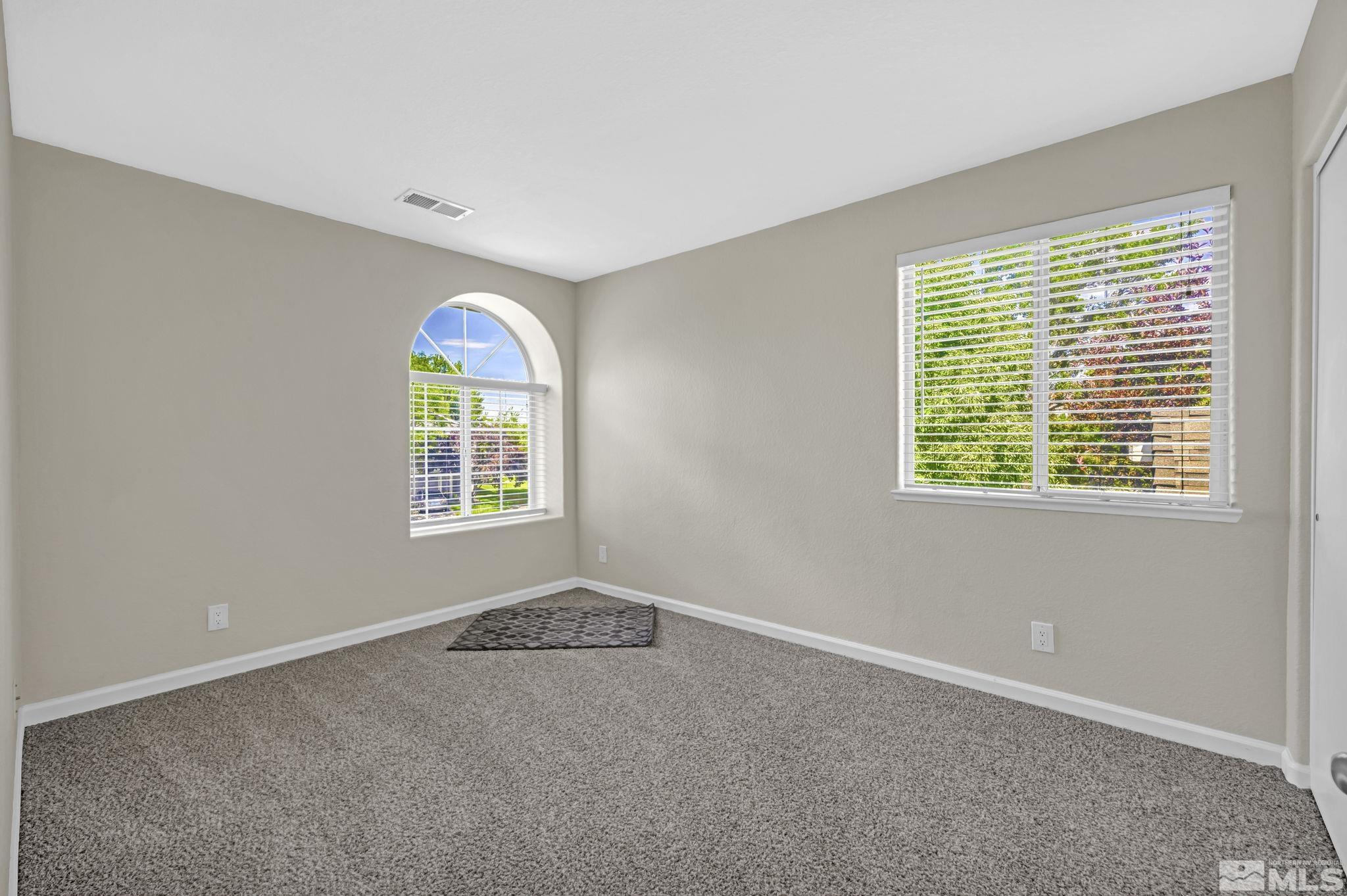 7491 Wheeldale Circle Reno, NV 89511 - Photo 25 of 33 an empty room with a window
