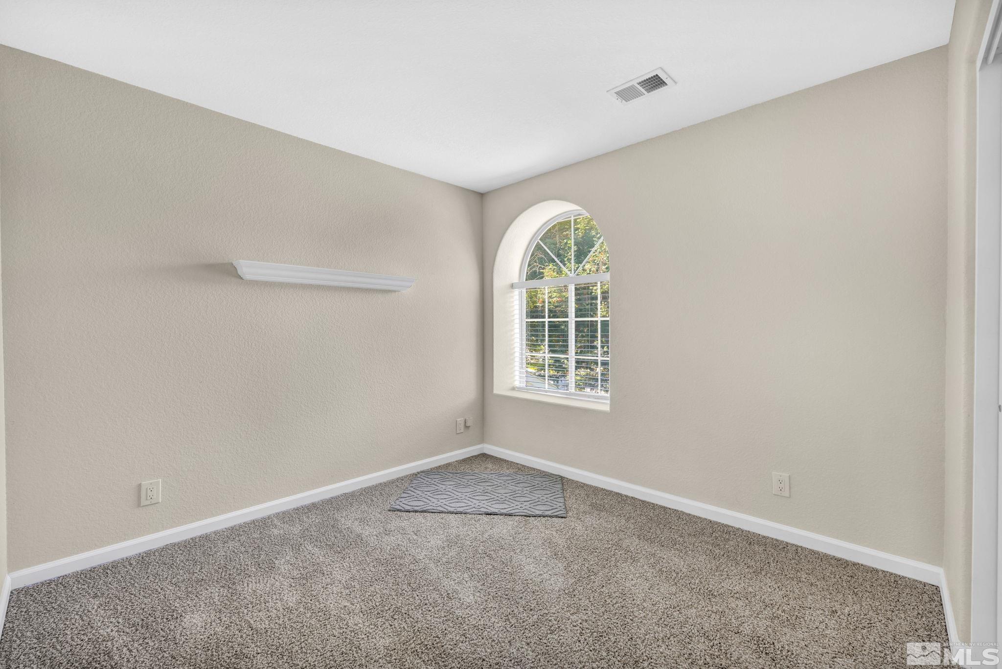 7491 Wheeldale Circle Reno, NV 89511 - Photo 28 of 33 an empty room with a window