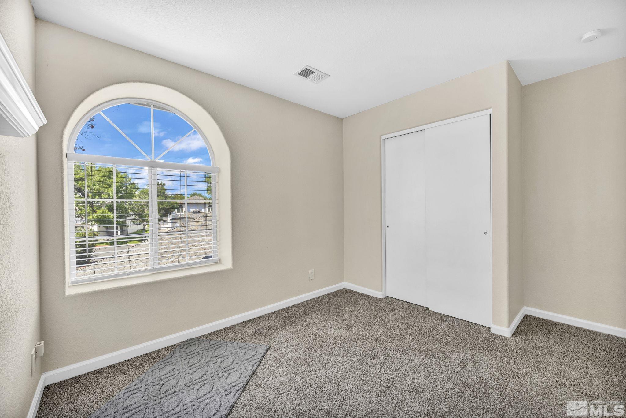 7491 Wheeldale Circle Reno, NV 89511 - Photo 29 of 33 a view of empty room with window