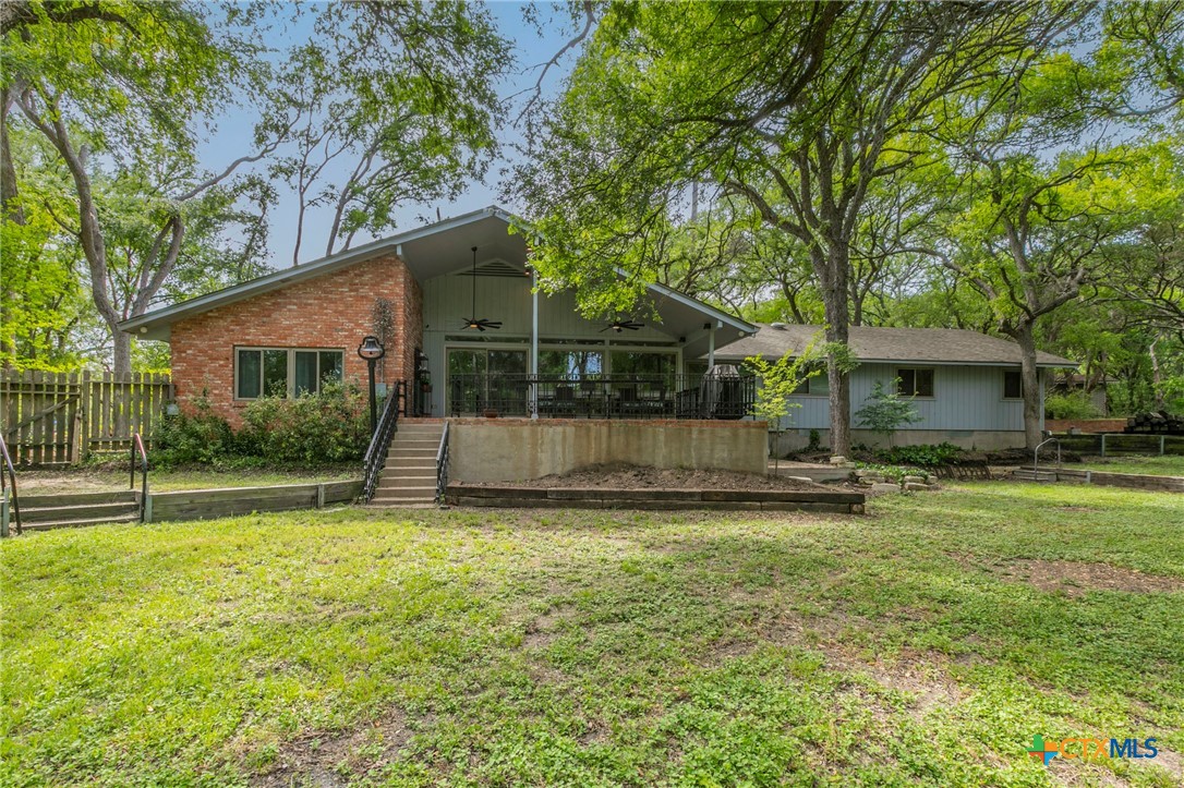 2518 Marlandwood Road Temple, TX 76502 - Photo 14 of 48 a view of a house with a yard and a large tree