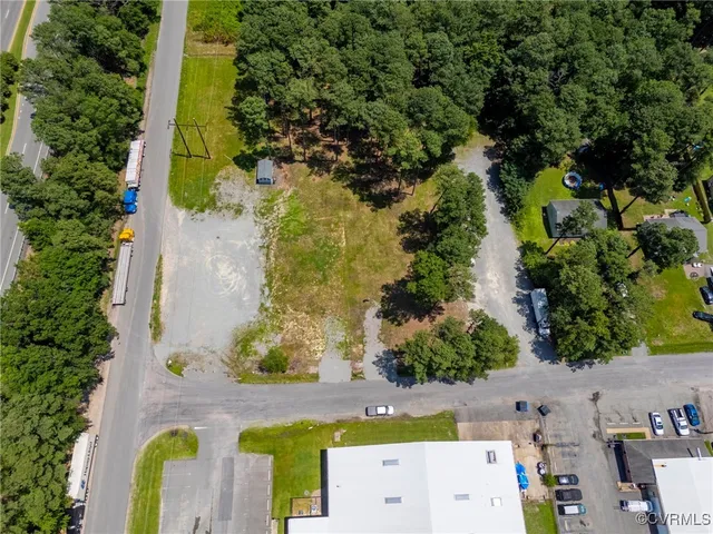 an aerial view of residential house with outdoor space