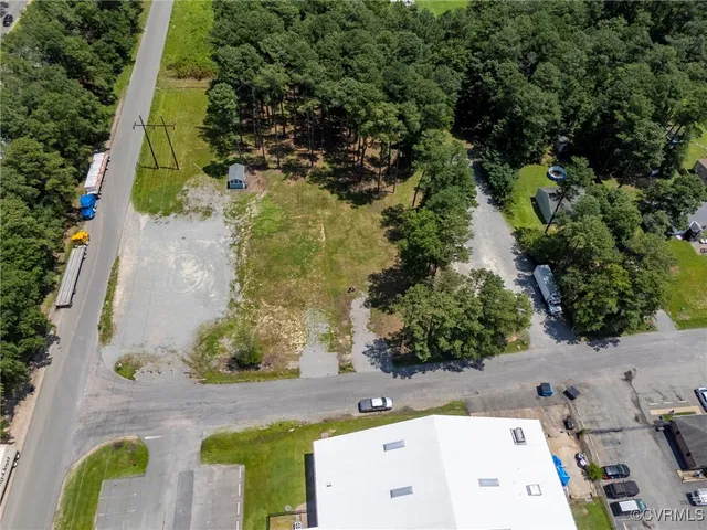 an aerial view of residential house with outdoor space