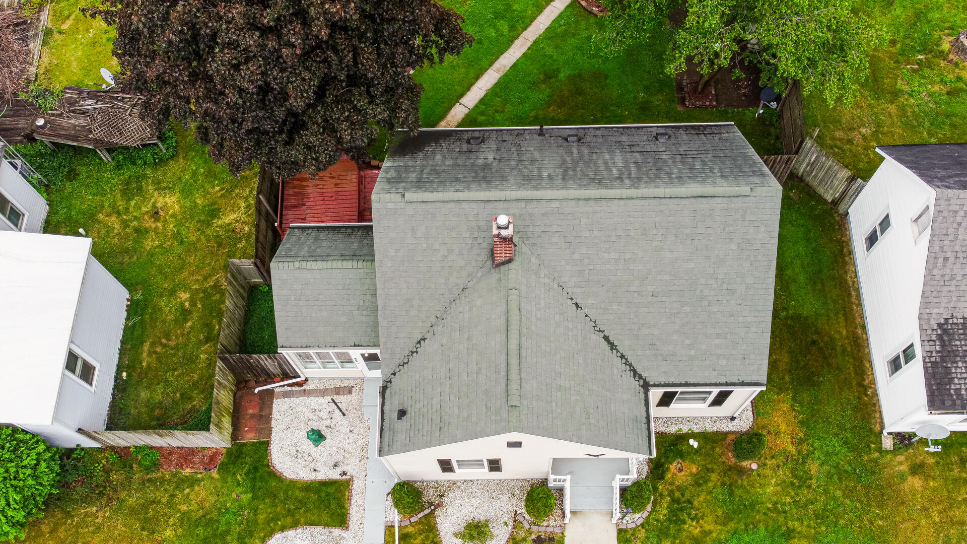 602 Ohio Street Walkerton, IN 46574 - Photo 28 of 31 an aerial view of a house with swimming pool and large trees