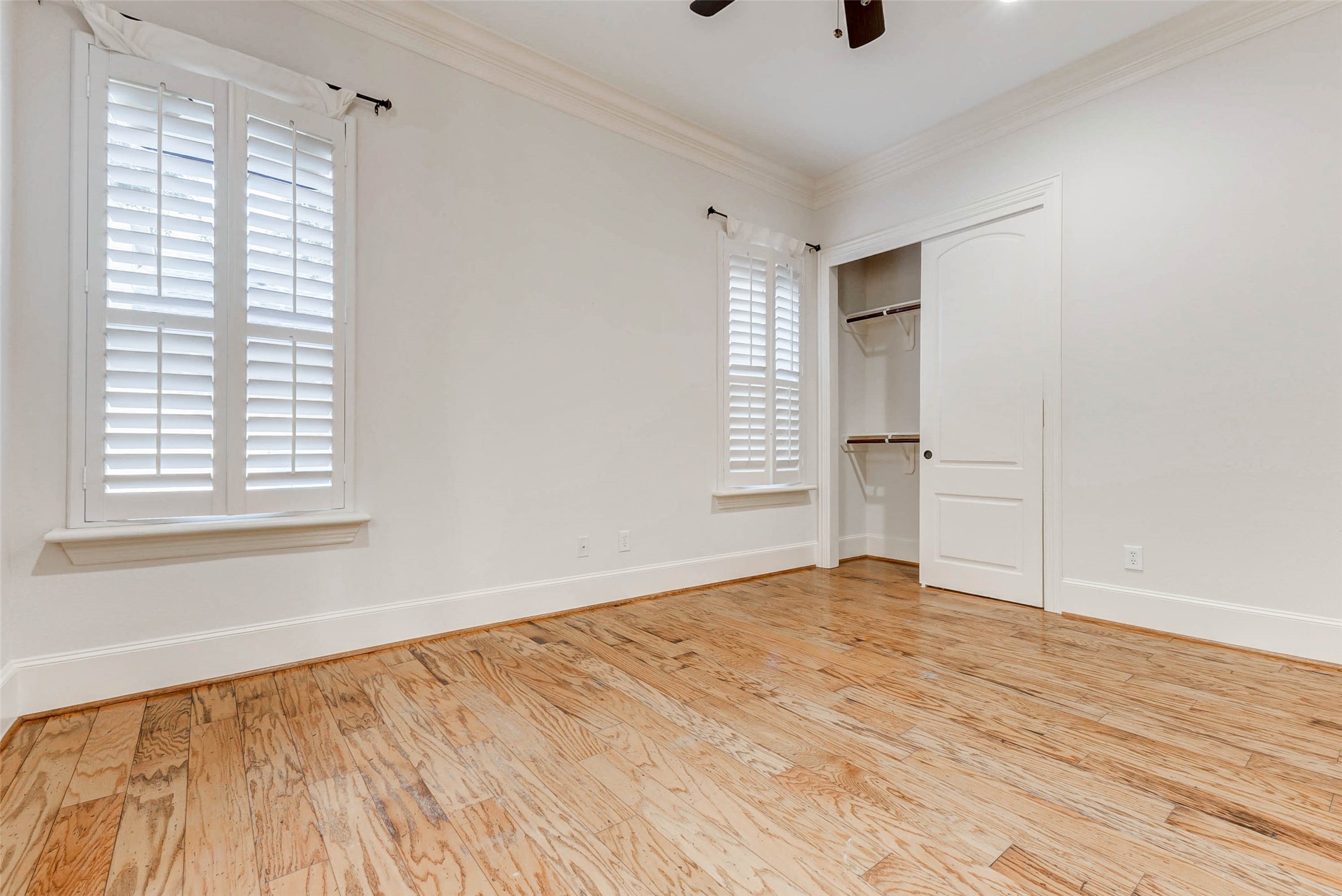 3509 Mirror Court Spring, TX 77388 - Photo 24 of 45 a view of an empty room with wooden floor and a window