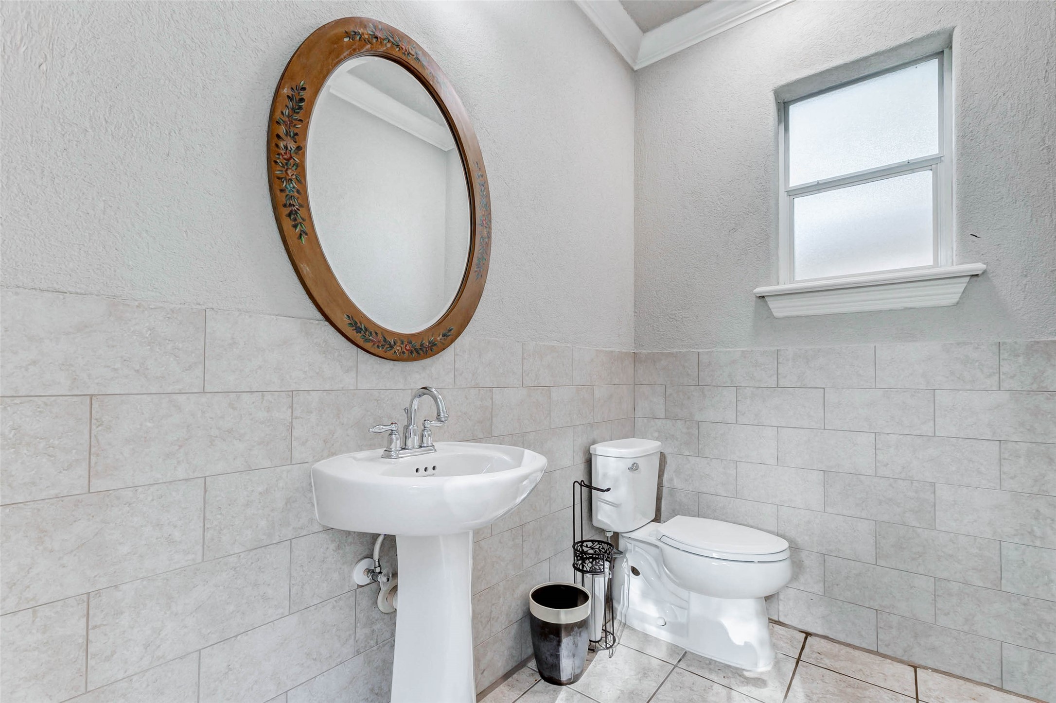 3509 Mirror Court Spring, TX 77388 - Photo 39 of 45 a bathroom with a sink a toilet and mirror