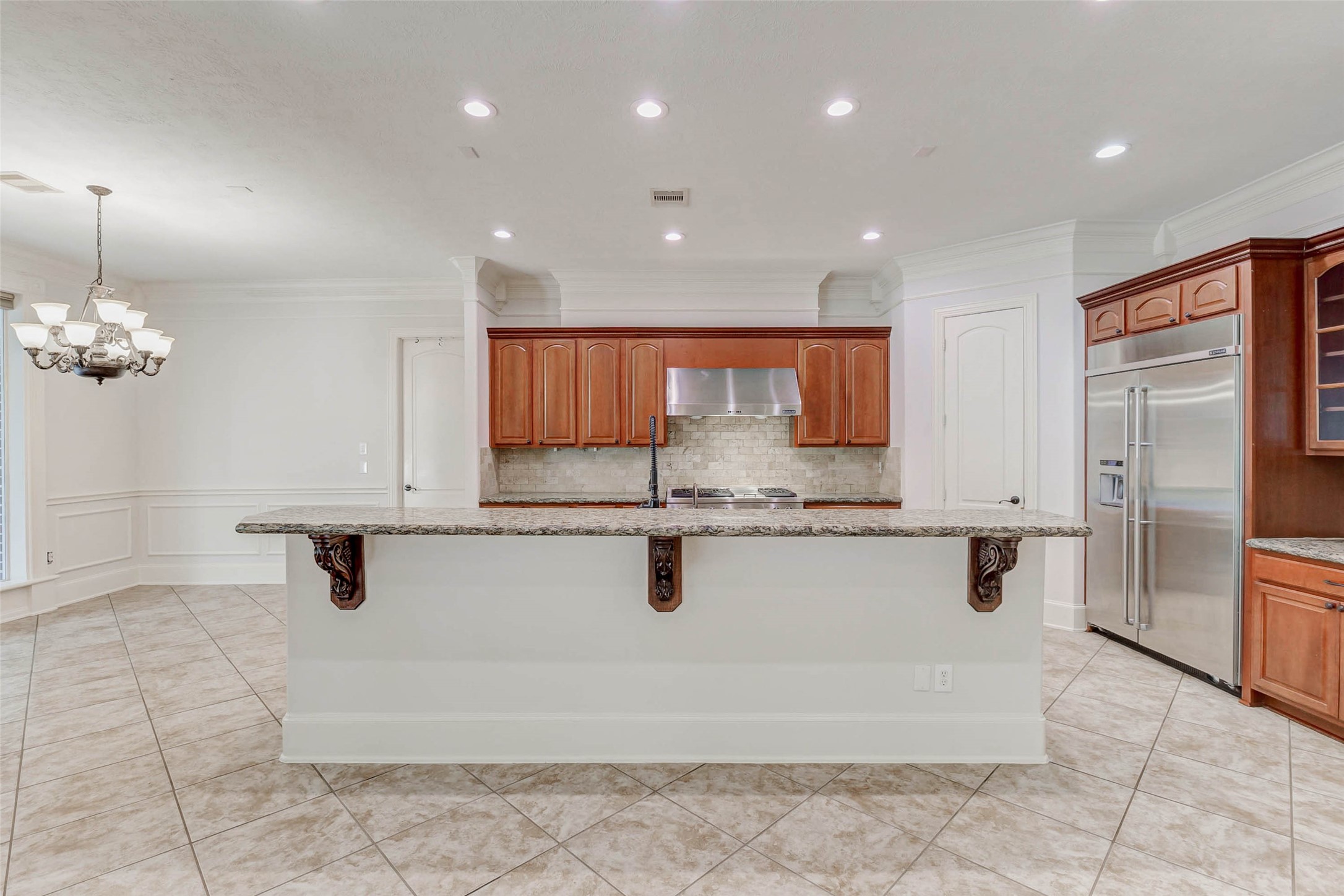 3509 Mirror Court Spring, TX 77388 - Photo 9 of 45 a kitchen with stainless steel appliances granite countertop a sink and cabinets