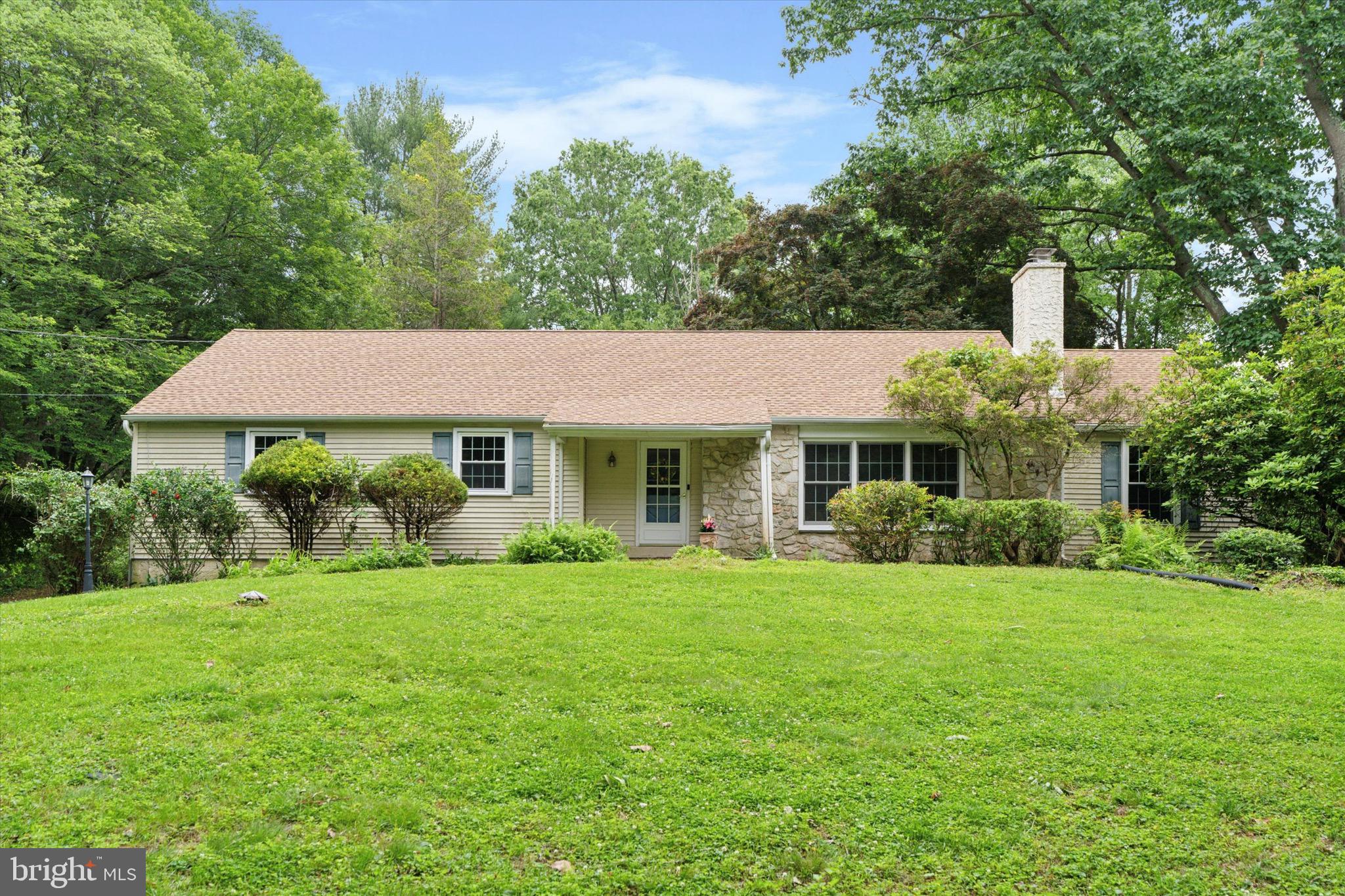 414 Darlington Road Media, PA 19063 - Photo 1 of 51 a front view of a house with a garden