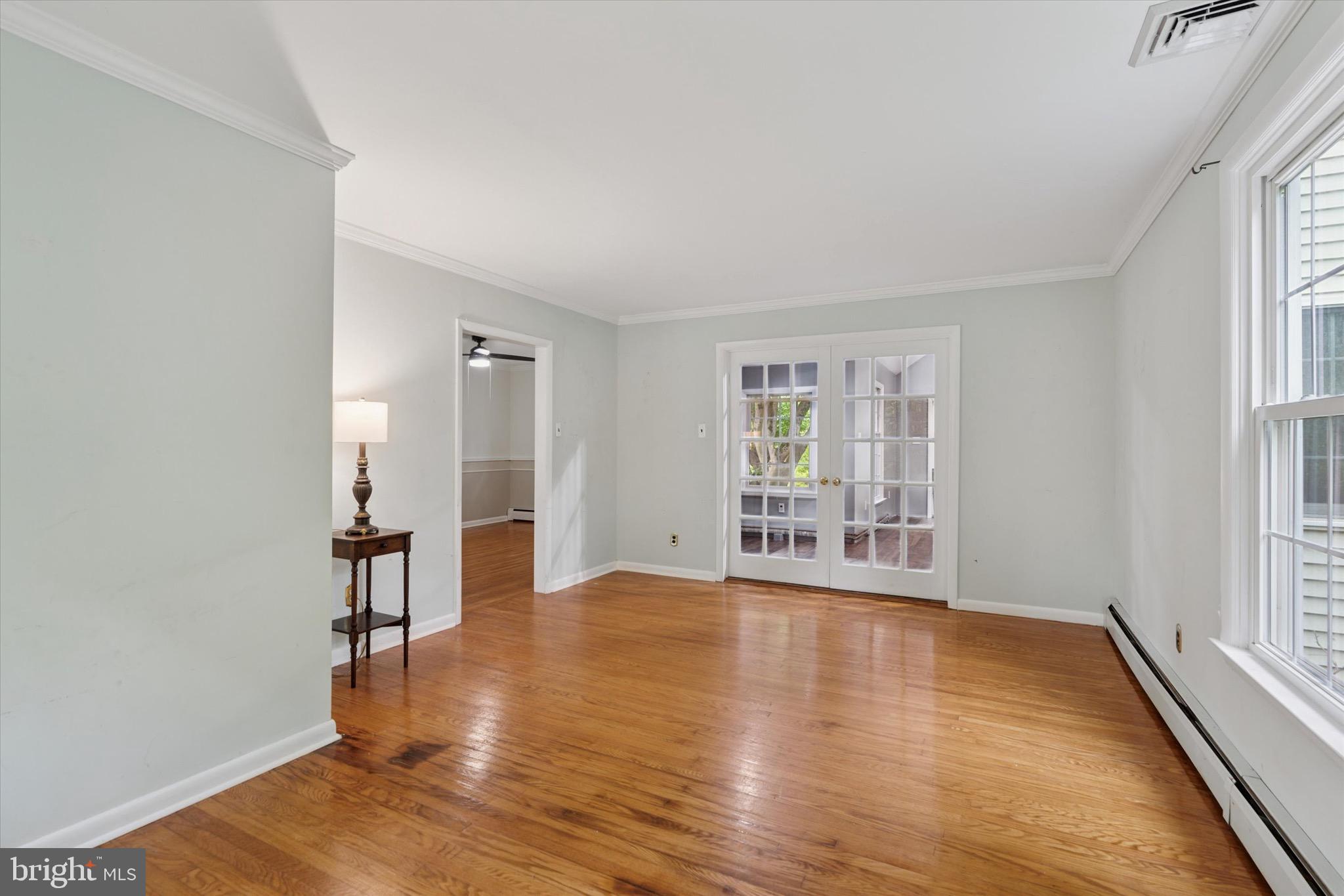 414 Darlington Road Media, PA 19063 - Photo 16 of 51 wooden floor in an empty room with a window