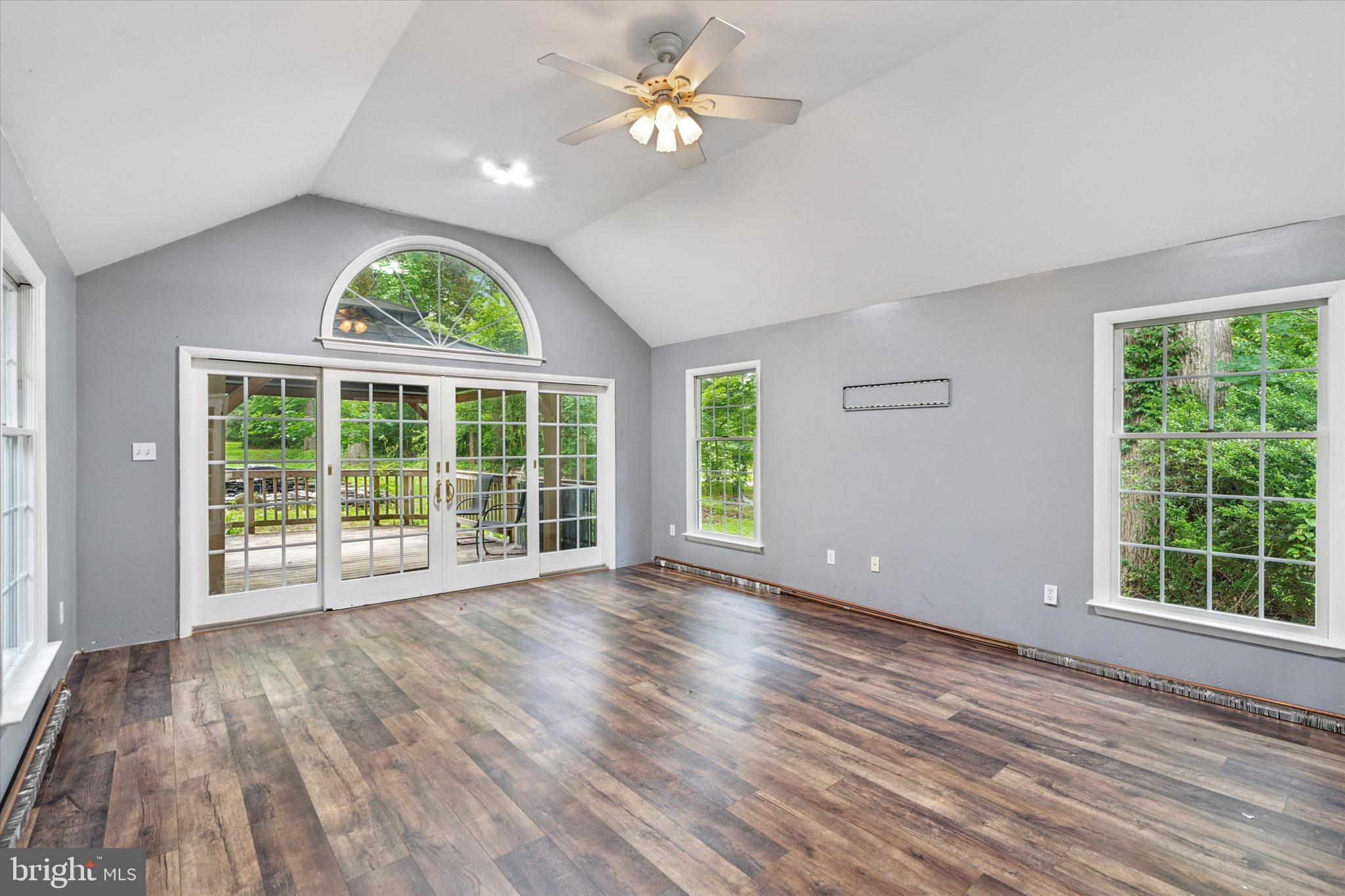 414 Darlington Road Media, PA 19063 - Photo 18 of 51 a view of an empty room with wooden floor and a window