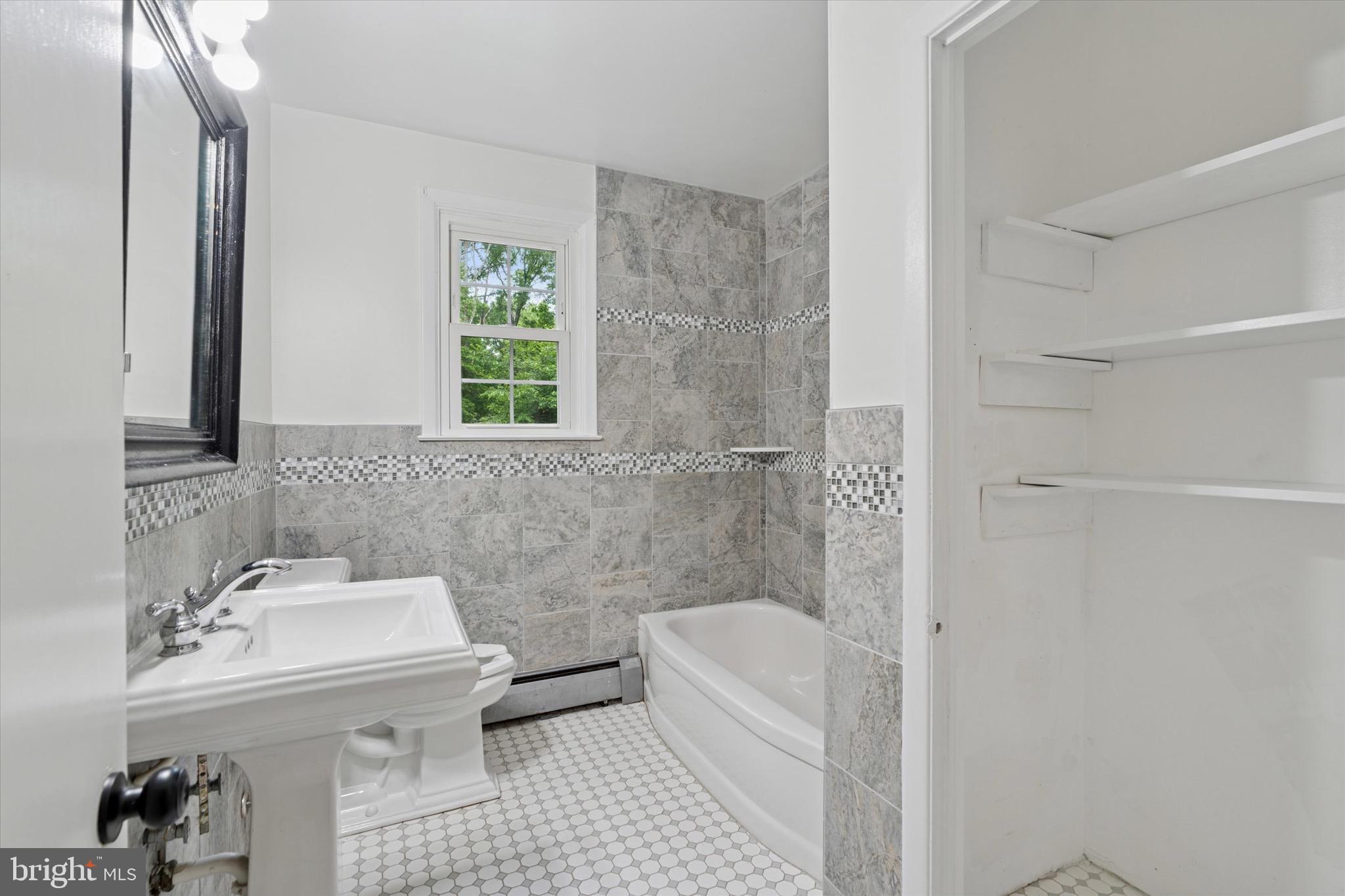 414 Darlington Road Media, PA 19063 - Photo 21 of 51 a bathroom with a sink toilet and shower