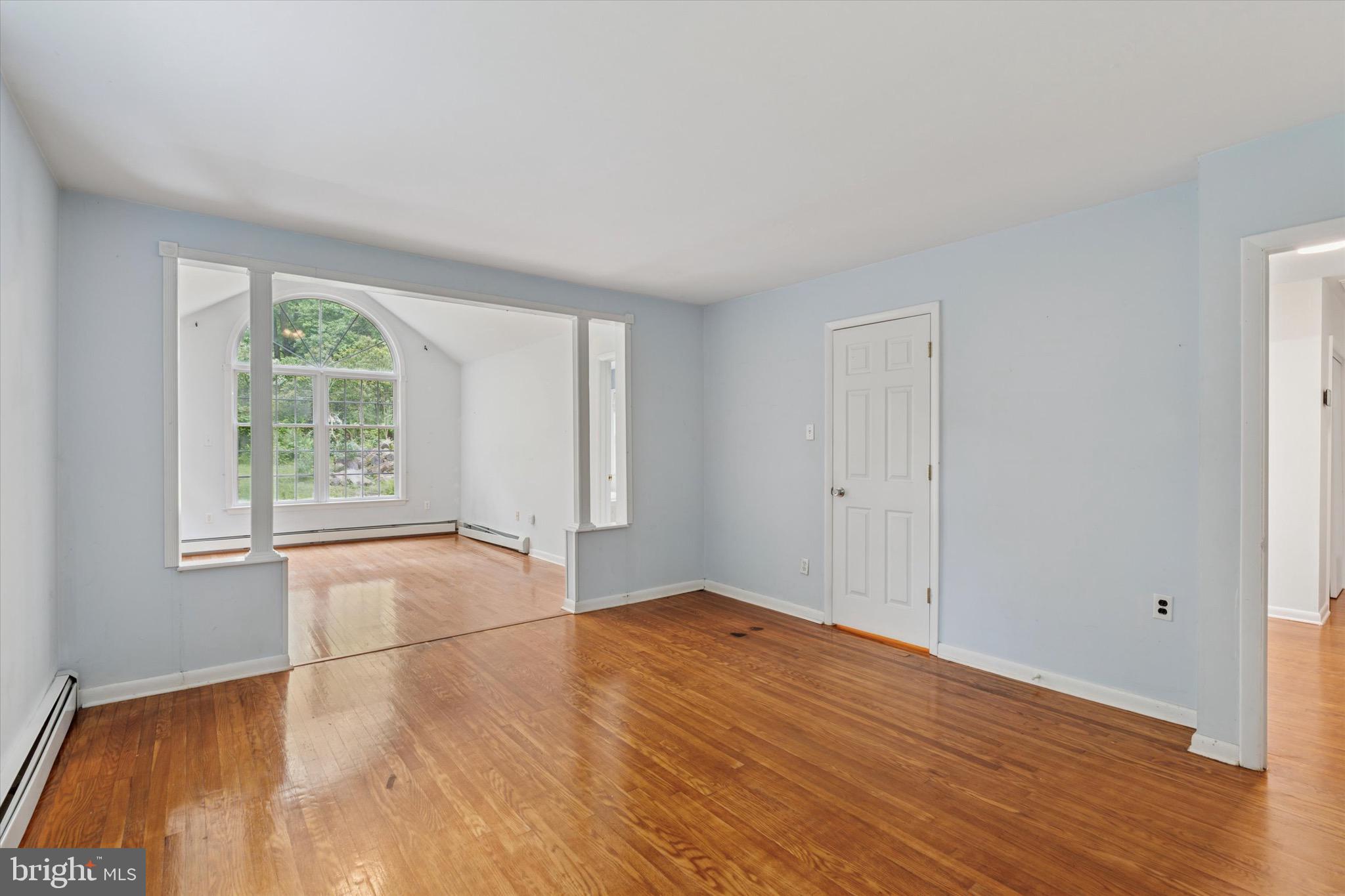 414 Darlington Road Media, PA 19063 - Photo 24 of 51 an empty room with wooden floor and windows