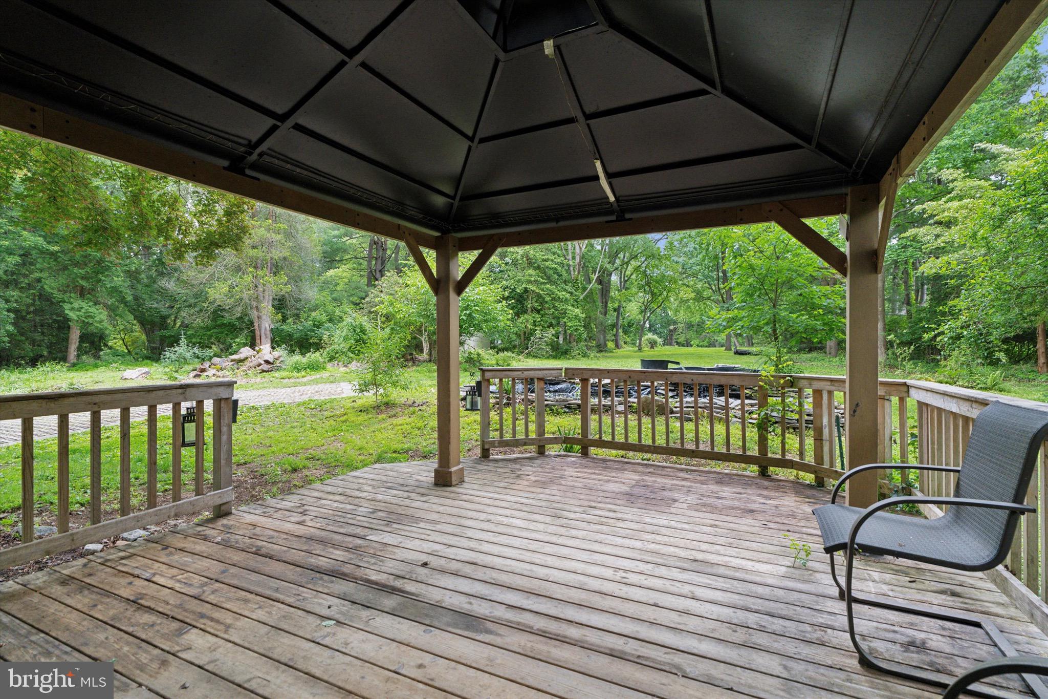 414 Darlington Road Media, PA 19063 - Photo 34 of 51 a view of a deck with wooden floor and wooden floor next to a yard