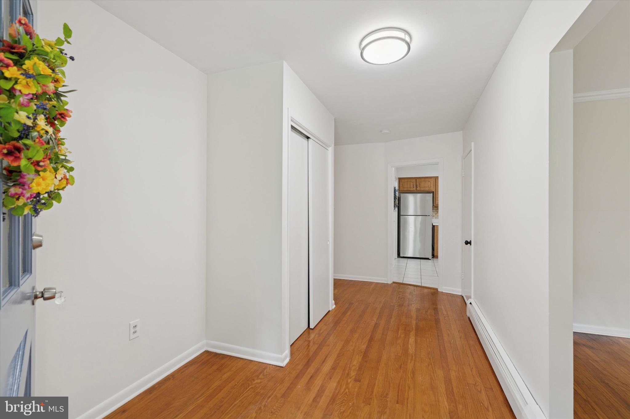 414 Darlington Road Media, PA 19063 - Photo 4 of 51 a view of a room with wooden floor and potted plant