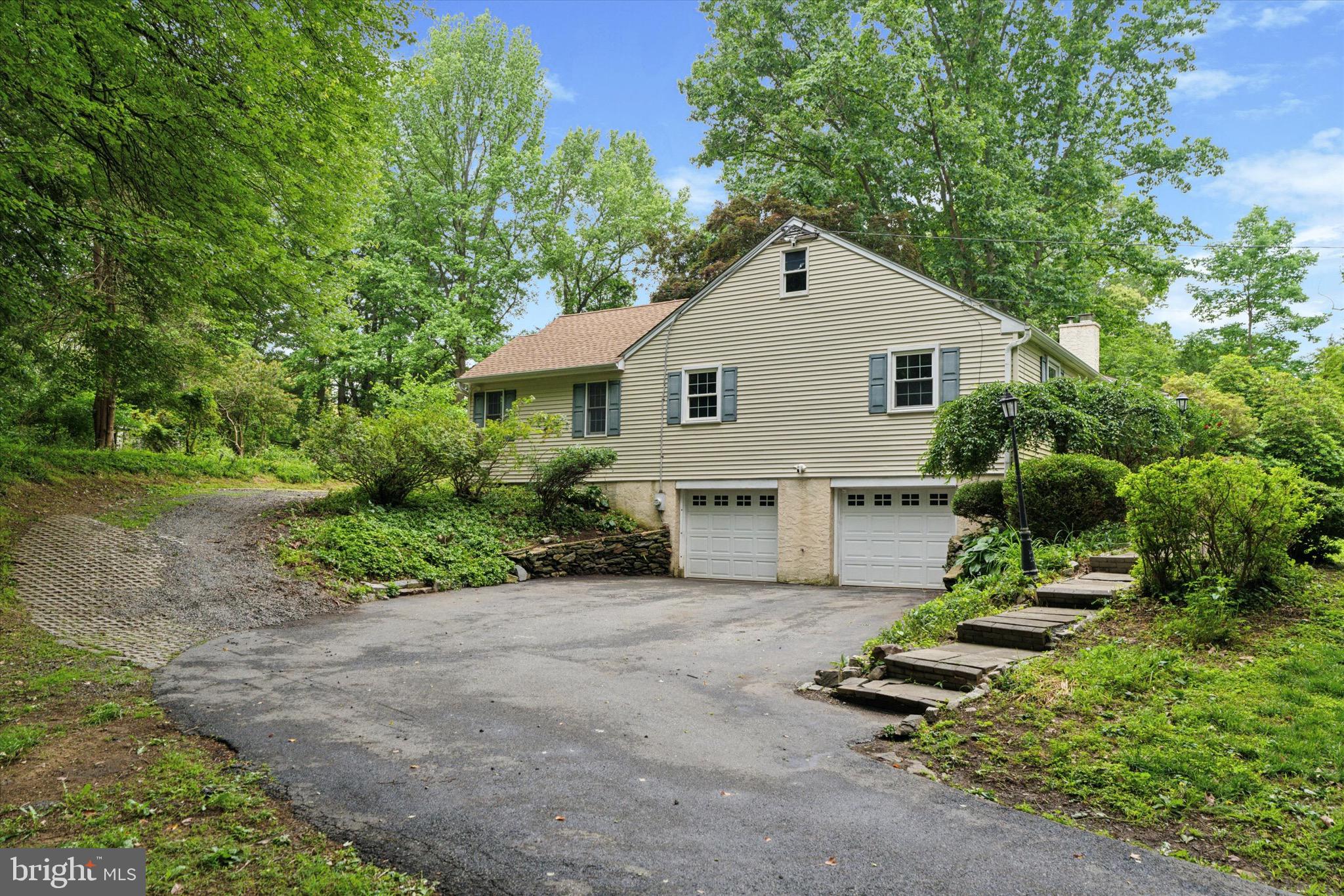 414 Darlington Road Media, PA 19063 - Photo 41 of 51 a house view with a garden space