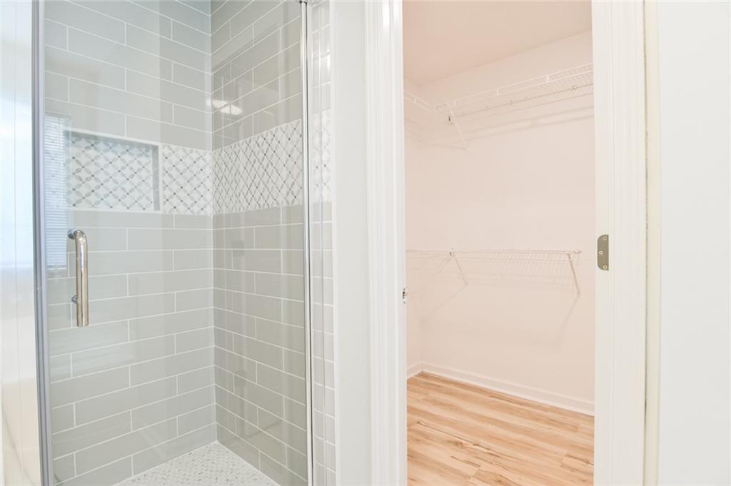 1255 Summit Point Lane Snellville, GA 30078 - Photo 23 of 41 a bathroom with a shower