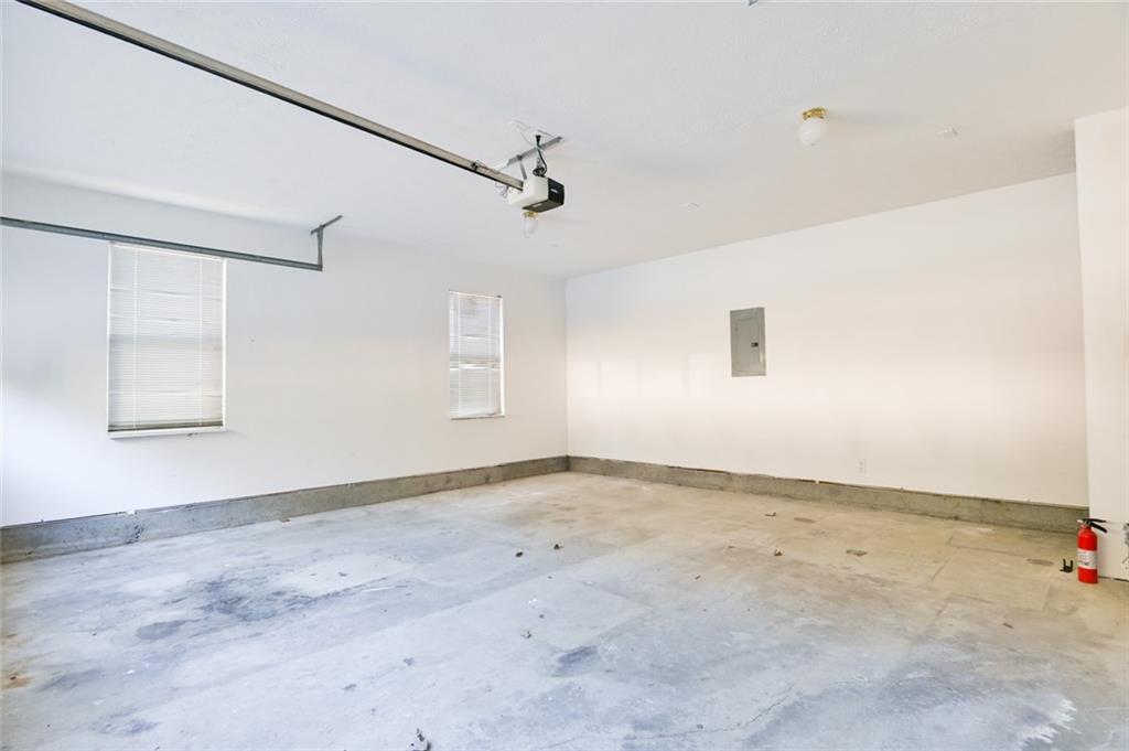 1255 Summit Point Lane Snellville, GA 30078 - Photo 35 of 41 an empty room with windows