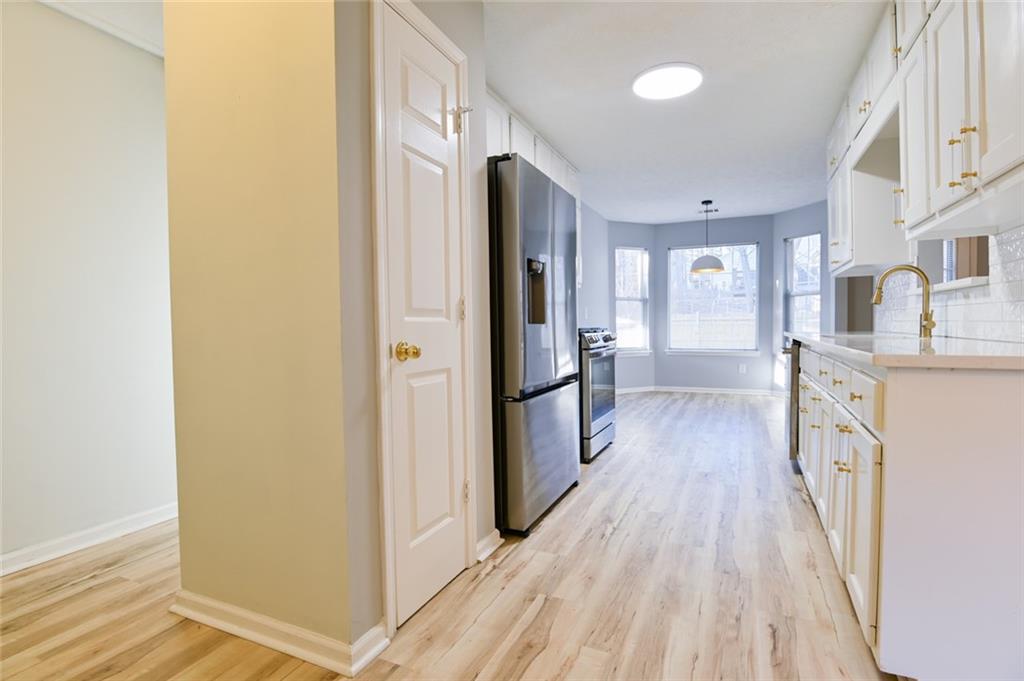 1255 Summit Point Lane Snellville, GA 30078 - Photo 10 of 41 a view of a kitchen from the hallway