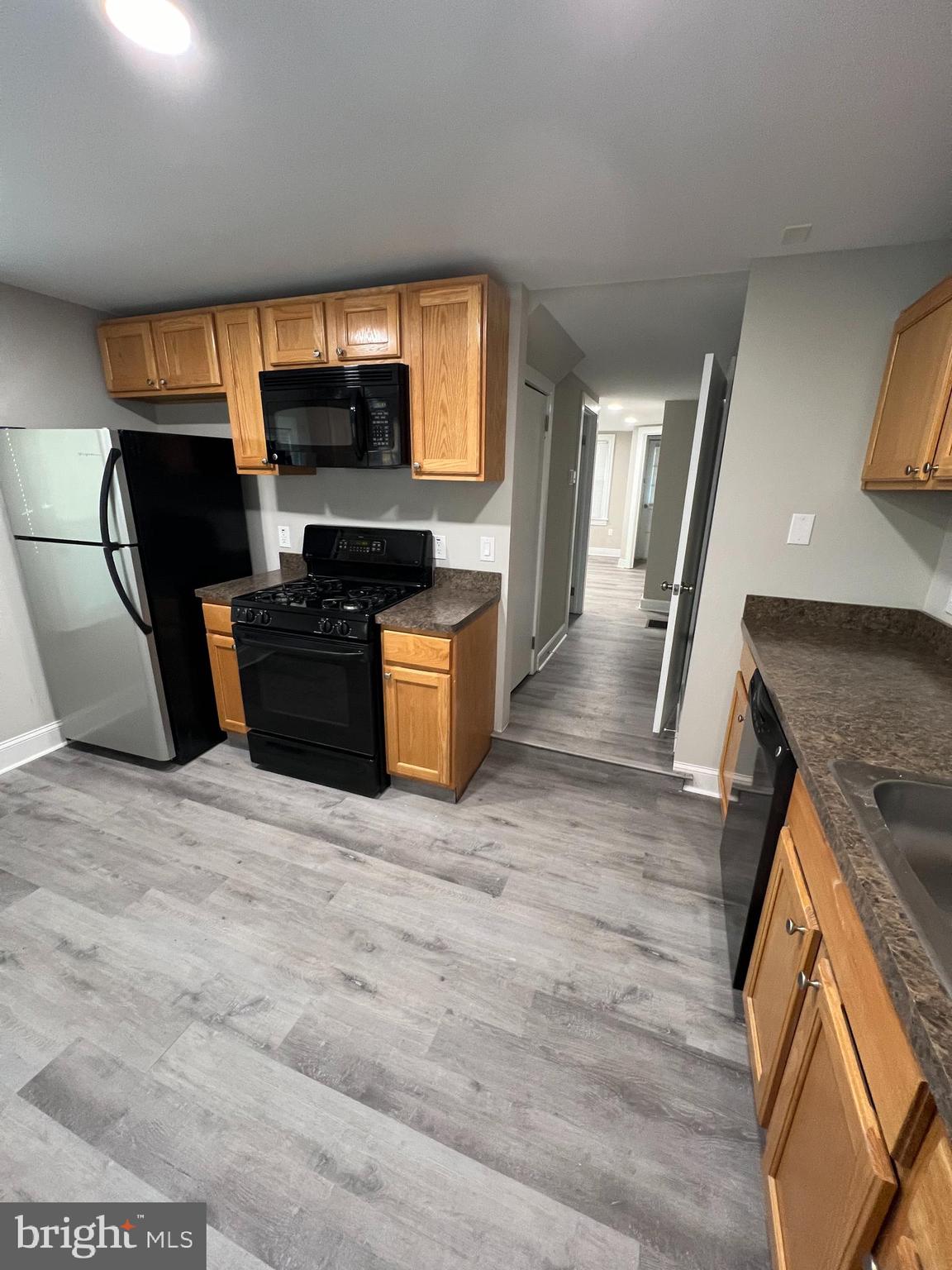 30 Spruce Avenue, Unit A Maple Shade, NJ 08052 - Photo 12 of 71 a view of kitchen with wooden floor and electronic appliances