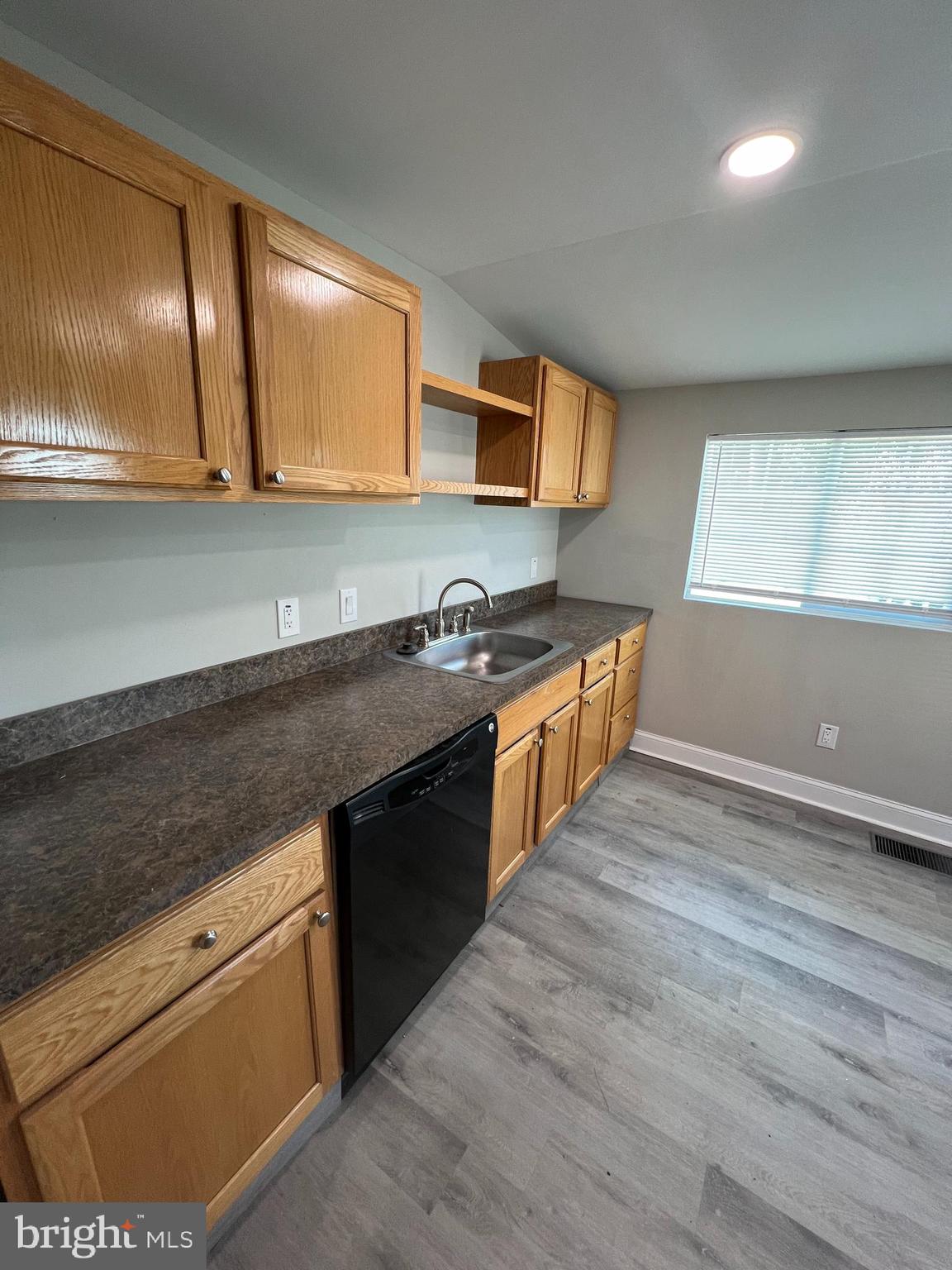 30 Spruce Avenue, Unit A Maple Shade, NJ 08052 - Photo 21 of 71 a kitchen with stainless steel appliances granite countertop a sink stove and cabinets
