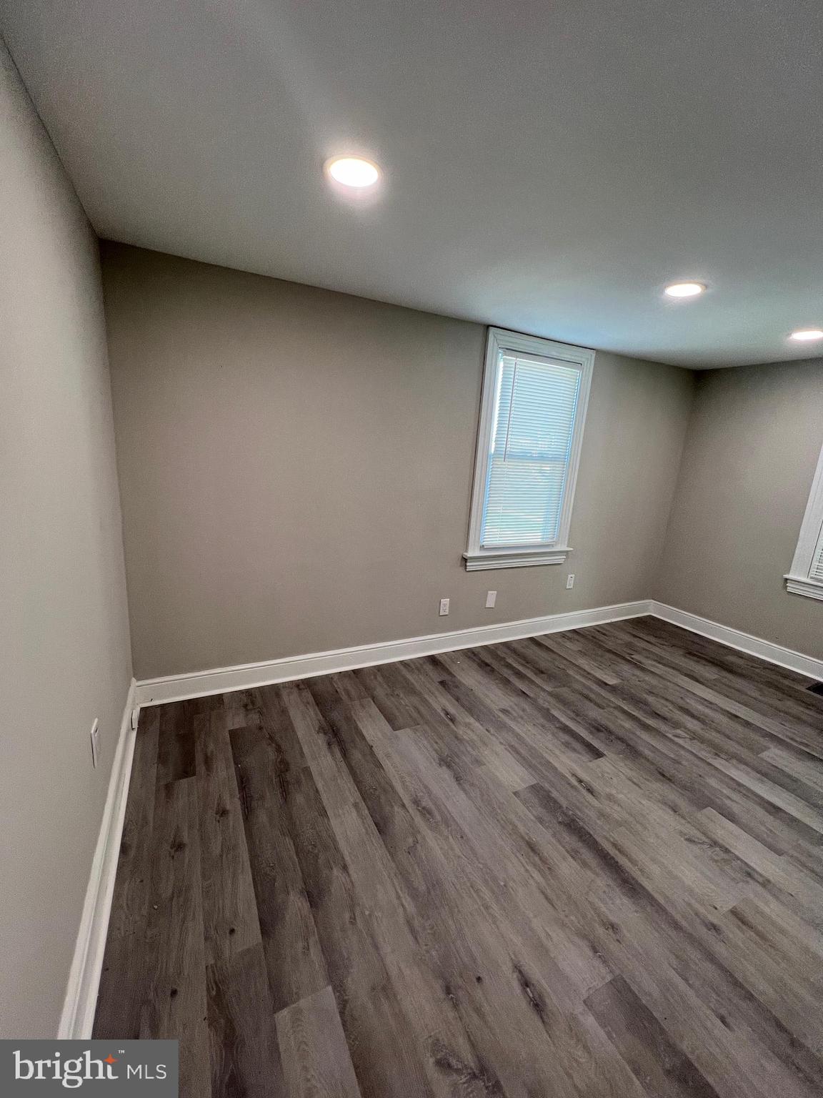 30 Spruce Avenue, Unit A Maple Shade, NJ 08052 - Photo 38 of 71 an empty room with wooden floor and windows