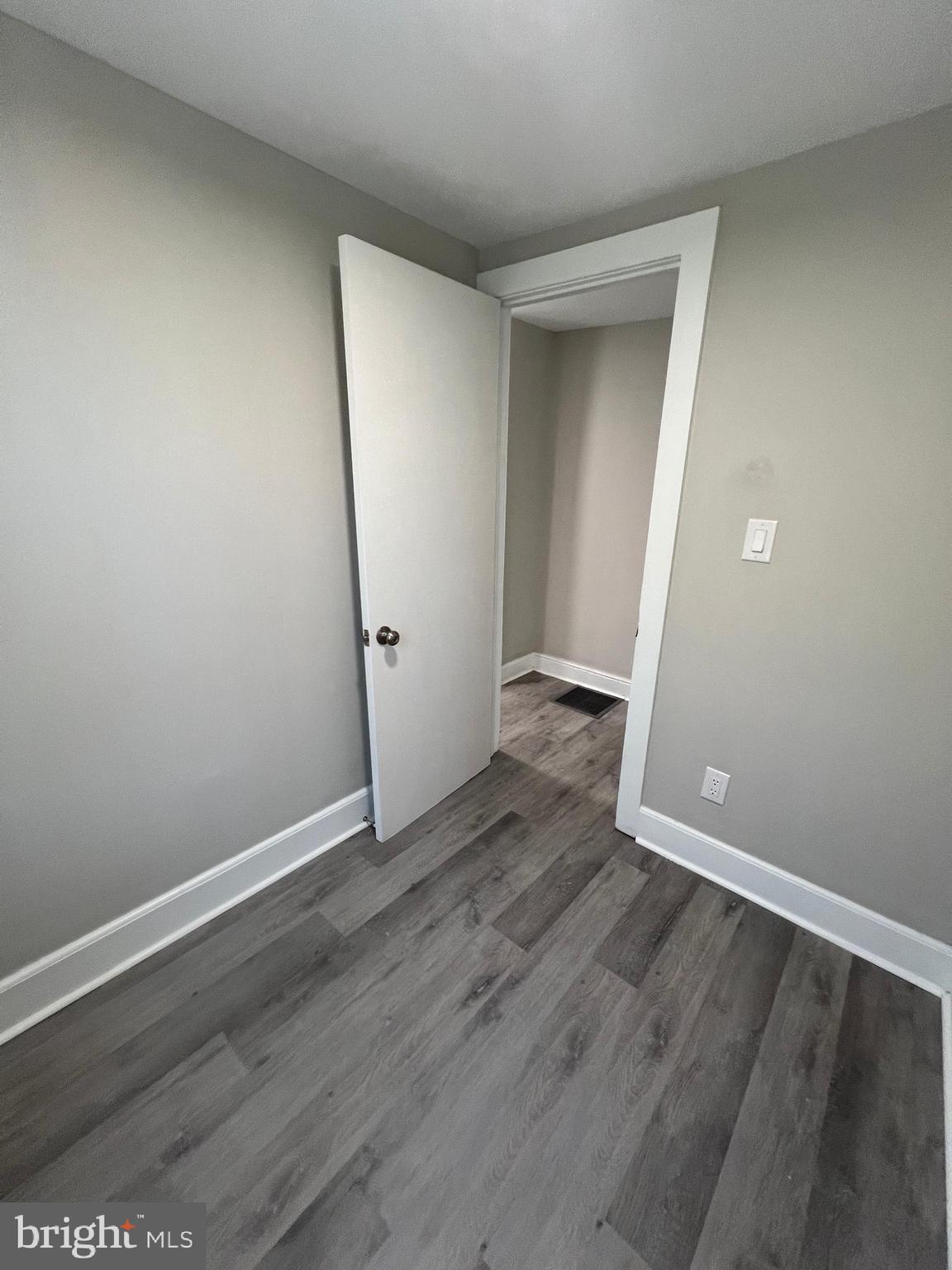 30 Spruce Avenue, Unit A Maple Shade, NJ 08052 - Photo 39 of 71 a view of an empty room with wooden floor and a window