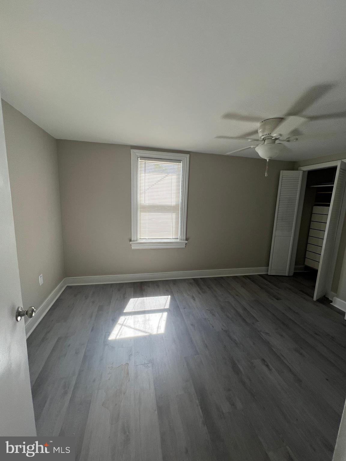 30 Spruce Avenue, Unit A Maple Shade, NJ 08052 - Photo 40 of 71 an empty room with wooden floor and windows