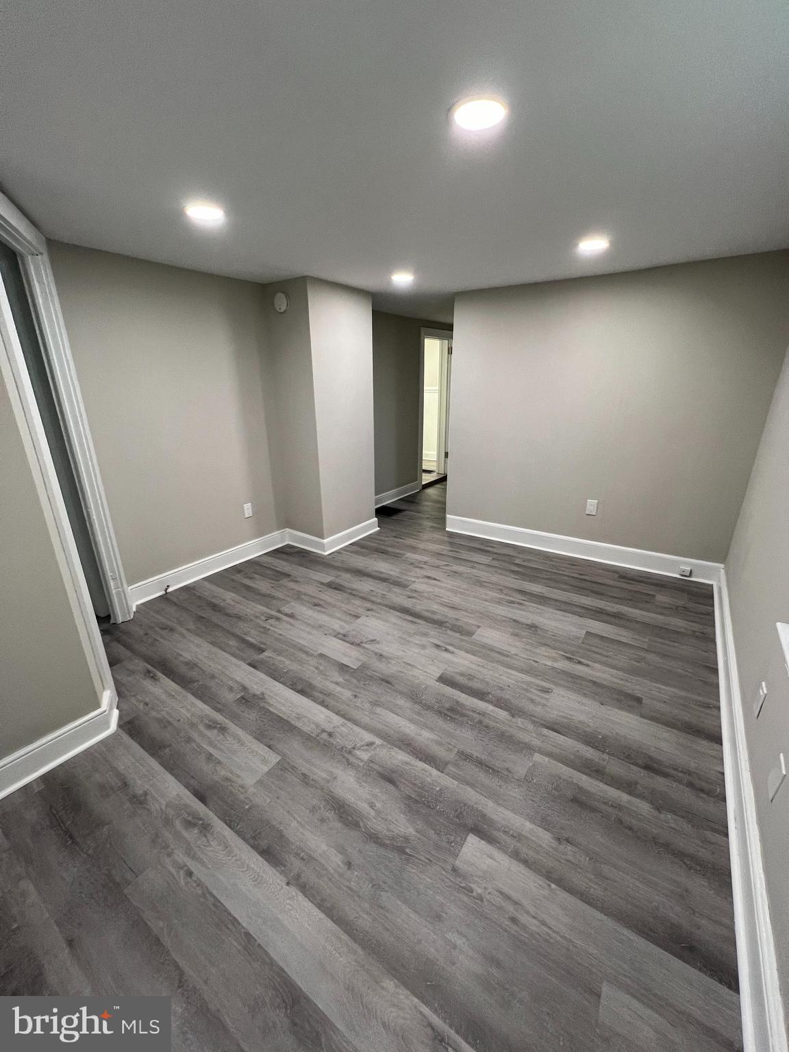 30 Spruce Avenue, Unit A Maple Shade, NJ 08052 - Photo 10 of 71 an empty room with wooden floor and windows