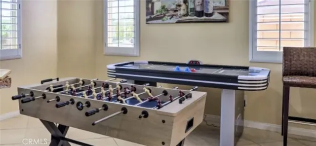 a swimming pool with outdoor seating yard and outdoor seating