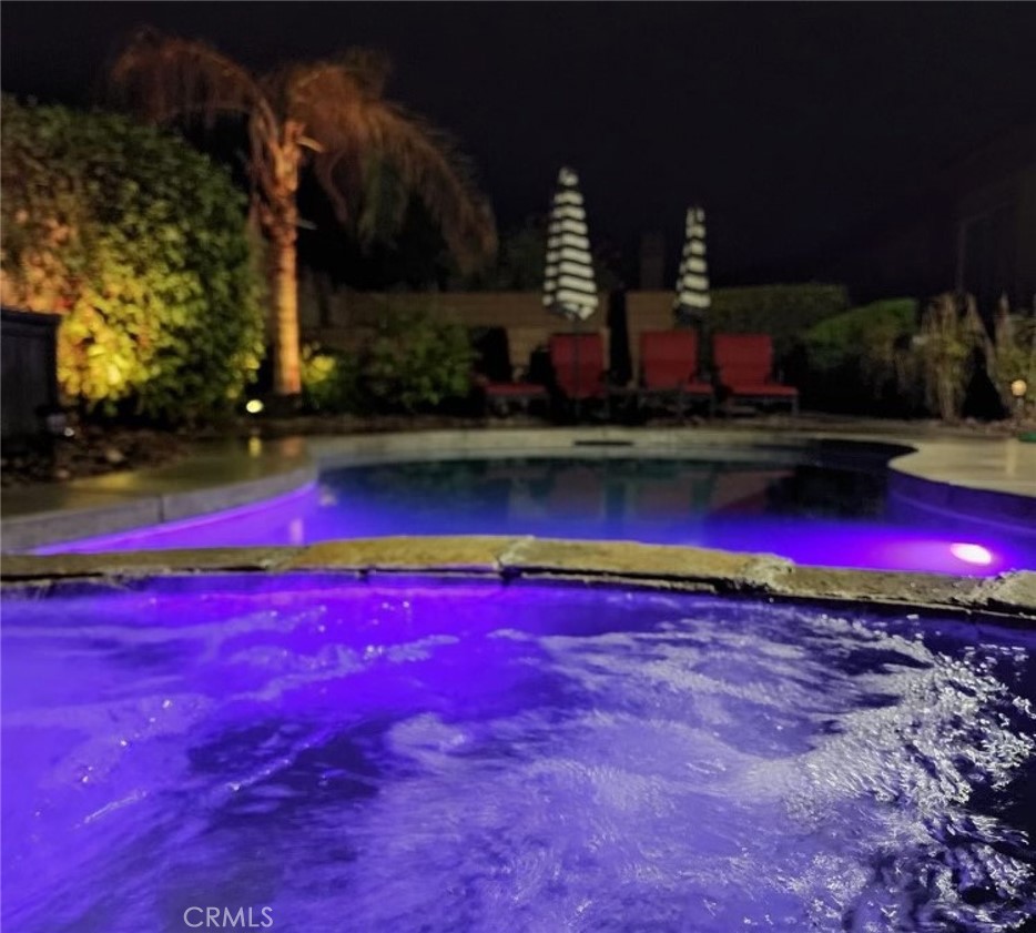 43277 Sentiero Drive Indio, CA 92203 - Photo 44 of 54 a view of swimming pool with outdoor space and seating area