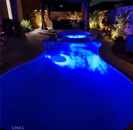 a view of swimming pool outdoor seating