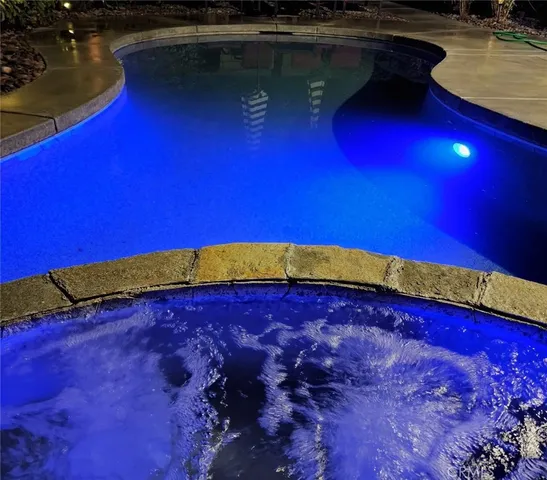 a view of a backyard of the house