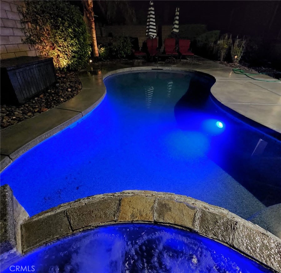 43277 Sentiero Drive Indio, CA 92203 - Photo 49 of 54 a view of swimming pool outdoor seating