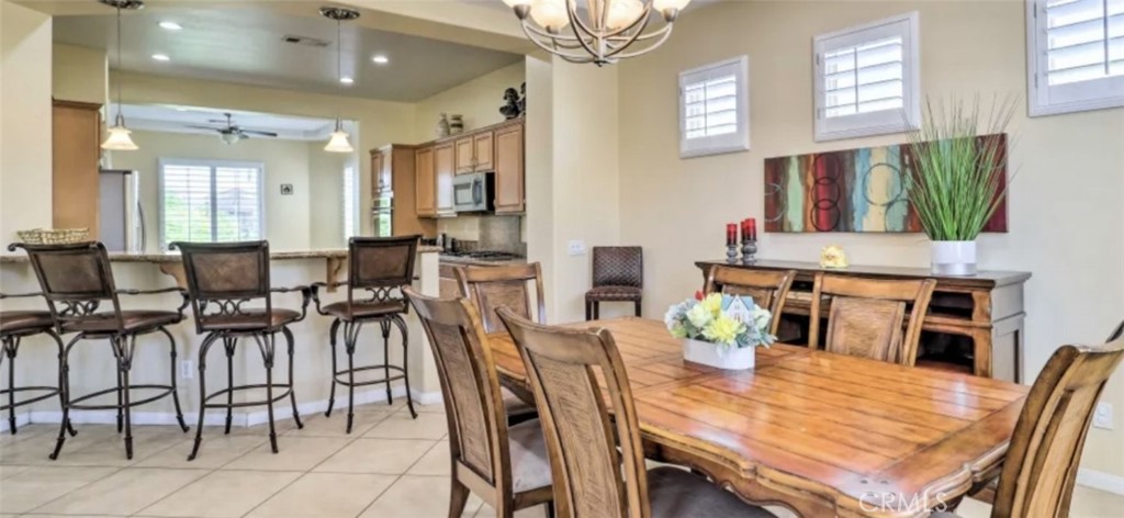 43277 Sentiero Drive Indio, CA 92203 - Photo 8 of 54 a view of a dining room with furniture
