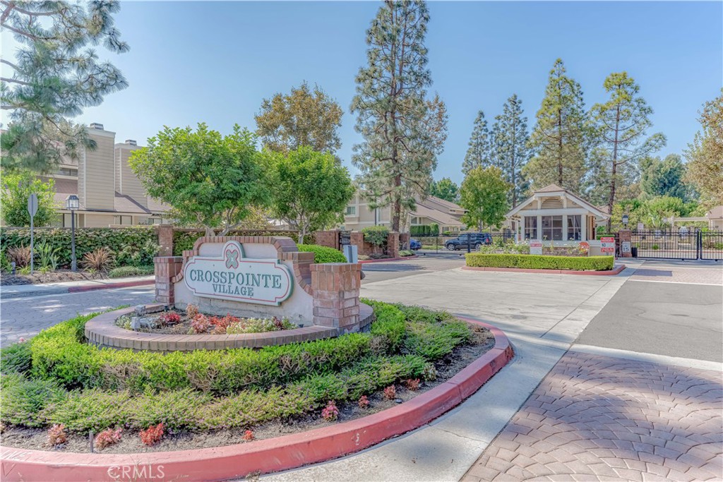 12660 Briarglen Loop, Unit G Stanton, CA 90680 - Photo 2 of 38 a view of a water fountain in front of the house