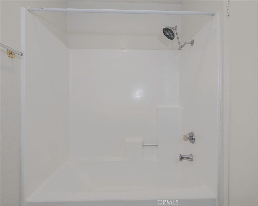 12660 Briarglen Loop, Unit G Stanton, CA 90680 - Photo 21 of 38 a close up of a shower