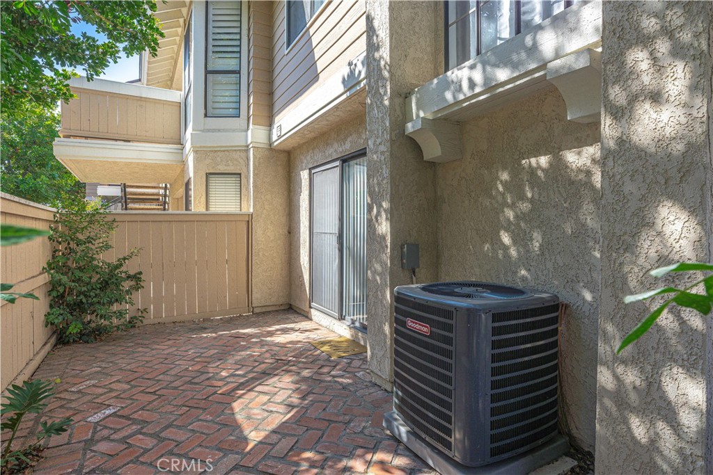 12660 Briarglen Loop, Unit G Stanton, CA 90680 - Photo 27 of 38 a front view of a house