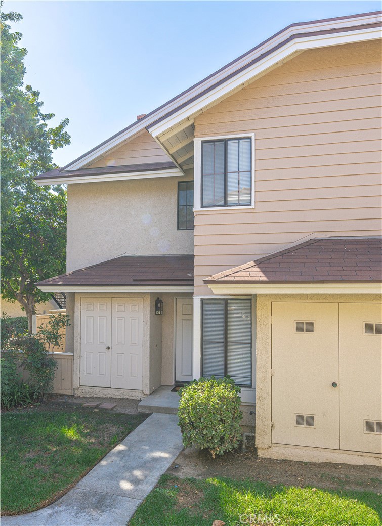 12660 Briarglen Loop, Unit G Stanton, CA 90680 - Photo 31 of 38 front view of a house