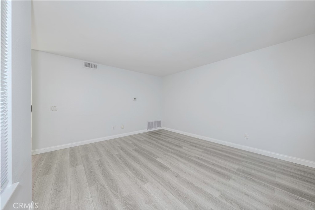 12660 Briarglen Loop, Unit G Stanton, CA 90680 - Photo 6 of 38 a view of an empty room