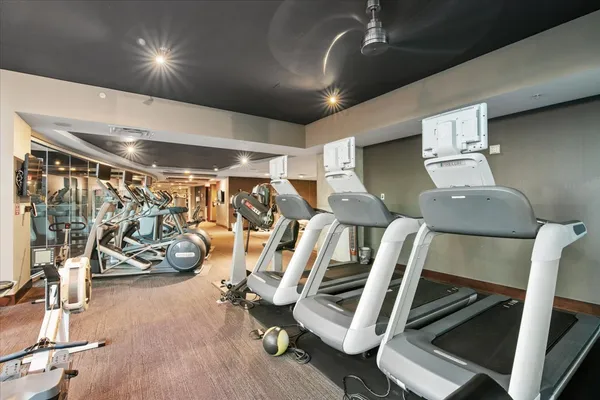 a view of a room with gym equipment