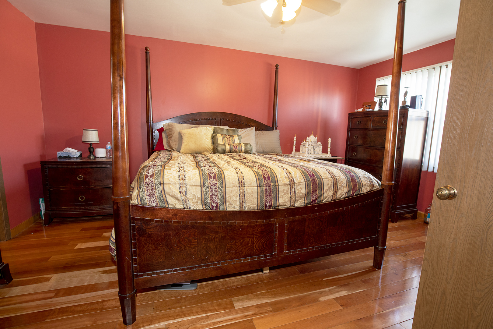 433 Highland Road Matteson, IL 60443 - Photo 16 of 27 a bedroom with a bed and a dresser