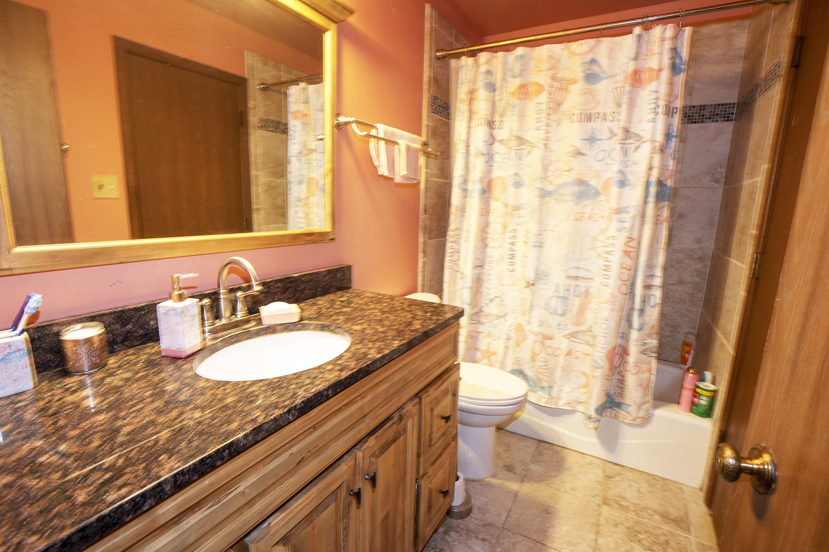 433 Highland Road Matteson, IL 60443 - Photo 19 of 27 a bathroom with a granite countertop sink and a mirror