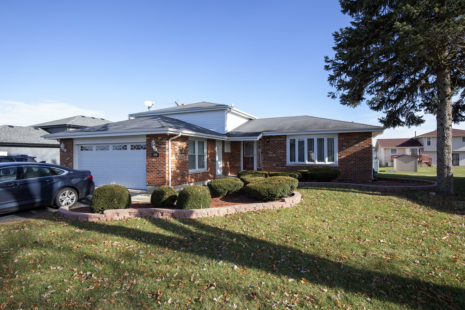 433 Highland Road Matteson, IL 60443 - Photo 27 of 27 a front view of a house with garden