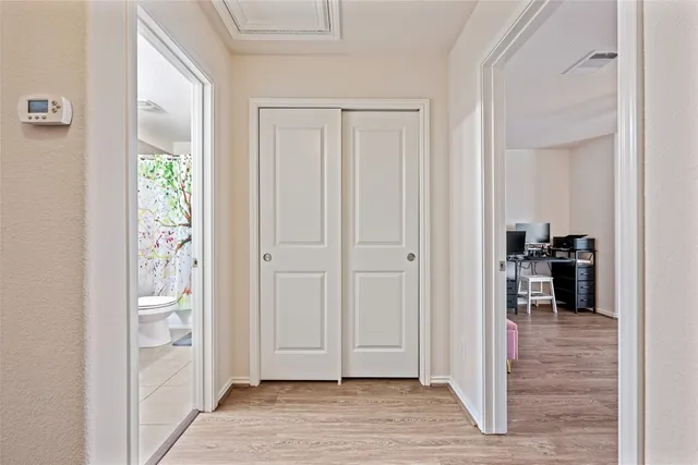 a view of entryway with wooden floor
